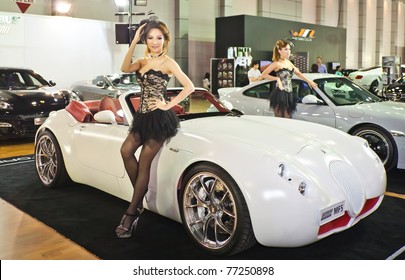 NONTABURI,THAILAND-MAY,15: A Maserati Sport Car On Display With Pretty Girl At The Super Car & Import Car Show,May 15,2011 In Nontaburi, Thailand