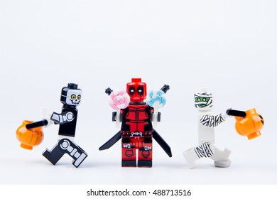 Nonthabure, Thailand - September, 24, 2016 : Lego ghost halloween want halloween candy Trick or Treat with Lego deadpool.Theme Halloween background.