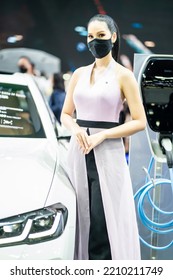 Nonthaburi, Thailand - DEC 4, 2021 - Unidentified Model Poses With A Car At The 38th Motor Expo Thailand 2021 At IMPACT Arena, Muang Thong Thani, Nonthaburi, Thailand.