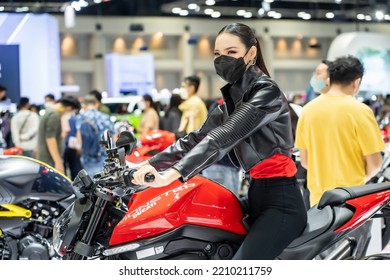 Nonthaburi, Thailand - DEC 4, 2021 - Unidentified Model Poses With A Car At The 38th Motor Expo Thailand 2021 At IMPACT Arena, Muang Thong Thani, Nonthaburi, Thailand.