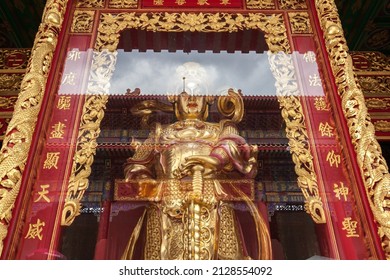 NONTHABURI, THAILAND - JULY 17: Golden Buddhism God Statue at Wat Borom Racha Kanjanapisek Anusorn, is Chinese spiritual complex with brightly painted shrines with golden seated Buddha on Jul 17, 2010