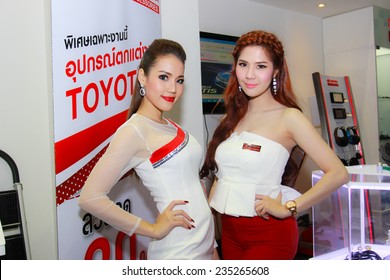 Nonthaburi, Thailand - November 28, 2014: Unidentified model  with Toyota accessories pose in the 31th  Thailand International Motor Expo on November 28, 2014 in Nonthaburi, Thailand.