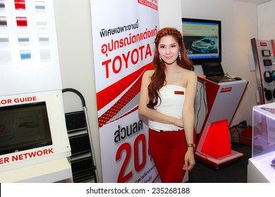 Nonthaburi, Thailand - November 28, 2014: Unidentified model  with Toyota accessories pose in the 31th  Thailand International Motor Expo on November 28, 2014 in Nonthaburi, Thailand.