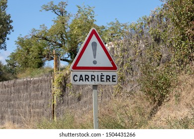 Nontron, Dordogne/France - 09 09 2019:  Watch Out, Carriére Sign Post. Watch Out For Your Career. Sign Post To Symbolize Career Growth, Path Or Opportunities.