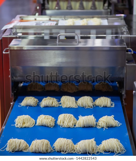 Noodle making\
machine and divider. Food\
industry