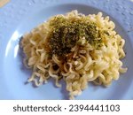Noodle with Nori and Halal Soyu. Takoyaki Flavour. Indonesian Noodle Product. In a plate. Isolated.