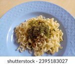Noodle with Nori, Soyu, and Mayonaise.  Takoyaki Flavour Mie Indonesia Product. On a Plate. Textured. 