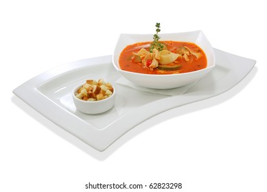 Noodle Soup Of Tomatoes With Zucchini And Rusks.