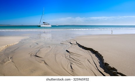 Noosa Heads Beautiful Tropical Beach With A Glassy Stream Eroding The Sand And Flowing Towards Two Sailboats On A Sunny Day During Summer, Little Cove, Sunshine Coast, Queensland, Australia