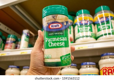 Norco, California/United States - 11/18/2019: A Hand Holds A Container Of Kraft Parmesan Cheese At A Local Grocery Store.