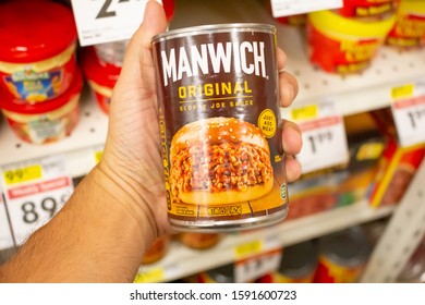 Norco, California/United States - 11/18/2019: A Hand Holds A Can Of Manwich Original Sloppy Joe Sauce At A Local Grocery Store.