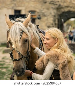 Nordic Caucasian Ethnicity Woman With Her Horse Dramatic Cinematic Photography In Folk Medieval Style Concept 