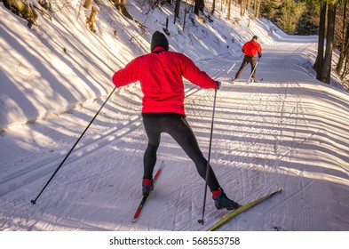 Nordic ski skier on the snow track in beautiful nature - sport active photo with space for your montage