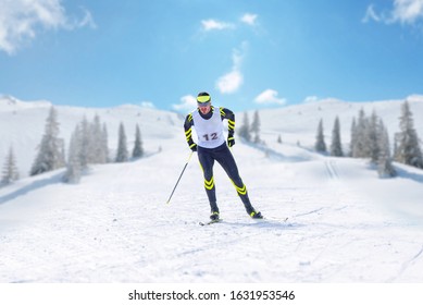 Nordic skier on the cross country race in running position