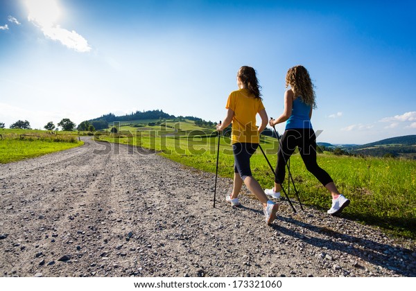 Nordic walking - active\
people outdoor 