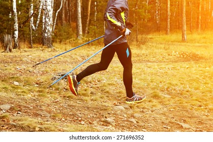 Nordic Walking Man. Athlete Jogging. Sport Outdoors