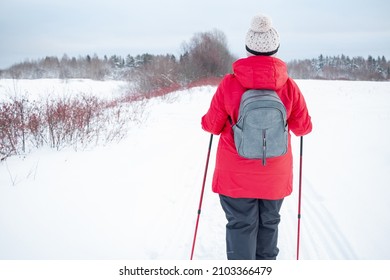 Nordic Walking In Winter. Grandma Goes In For Sports.