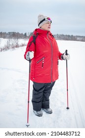 Nordic Walking In Winter. Grandma Goes In For Sports.