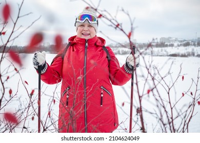 Nordic Walking In Winter. Grandma Goes In For Sports.