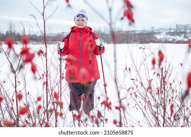 Nordic Walking In Winter. Grandma Goes In For Sports.