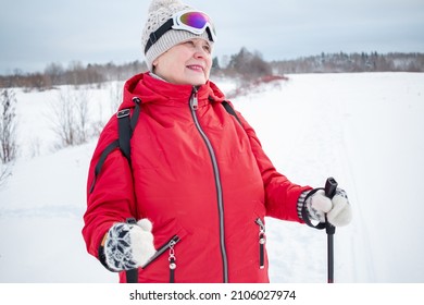 Nordic Walking In Winter. Grandma Goes In For Sports.