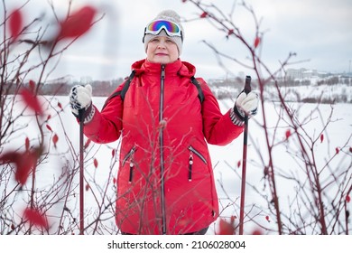 Nordic Walking In Winter. Grandma Goes In For Sports.