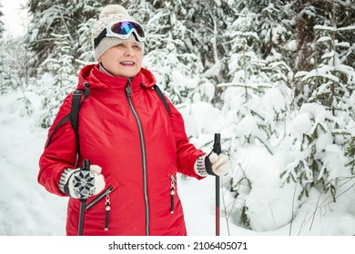 Nordic Walking In Winter. Grandma Goes In For Sports.