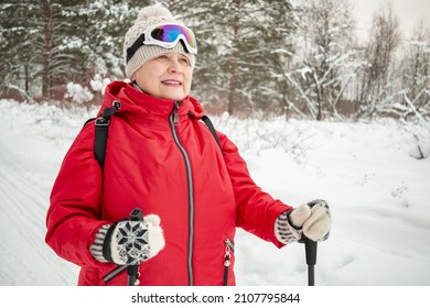 Nordic Walking In Winter. Grandma Goes In For Sports.