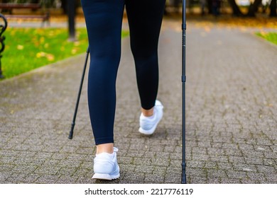 Nordic Walking - Woman Training In City Park 