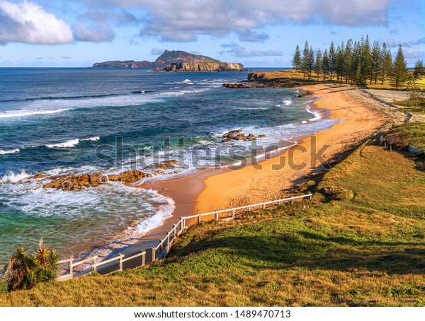 Norfolk Island, South Pacific,\
Australia:\
Cemetery Bay, fringed by Norfolk island pines is\
another spectacular vista on Norfolk\
island.