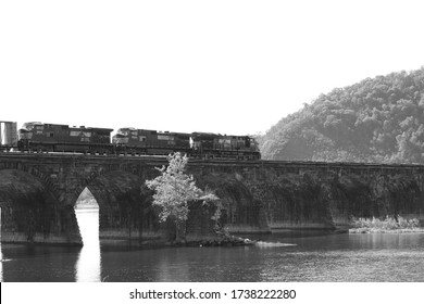 Norfolk Southern Freight Train crossing westbound on the Rockville Bridge over the Susquehanna River in Harrisburg, Pennsylvania, USA, Ocobter 19, 2019