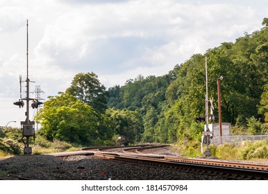 A Norfolk Southern railroad crossing in East Pittsburgh, Pennsylvania, USA on a sunny summer day