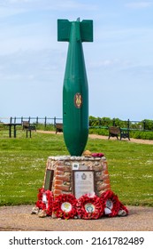 Norfolk, UK - May 17th 2022: The Royal Engineers Bomb Disposal Memorial, dedicated to those killed clearing British landmines from the Norfolk coast between 1844-1953.