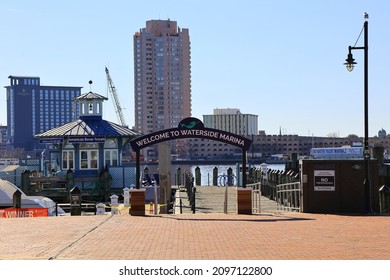 Norfolk, VA, USA - December 26, 2021: View Of The Norfolk Waterside Marina Looking Across The Elizabeth River To The City Of Portsmouth.