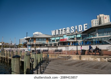 Norfolk, VA, US-November 13, 2021:  View Of The Skyline Of The City On The Waterfront With Iconic Skyscrapers, Restaurants And Naval Ships.