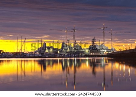 Norfolk, Virginia, USA shipyard on the Chesapeake at golden hourl.