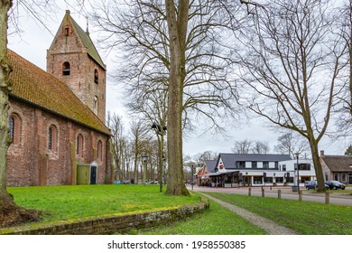 Norg, The Netherlands - March 21, 2021: Village view with church of picturesque old village Norg located in municipality of Noordenveld in Drenthe in The Netherlands