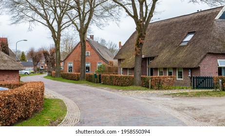Norg, The Netherlands - March 21, 2021: Village view with historic houses in picturesque old village Norg located in municipality of Noordenveld in Drenthe in The Netherlands