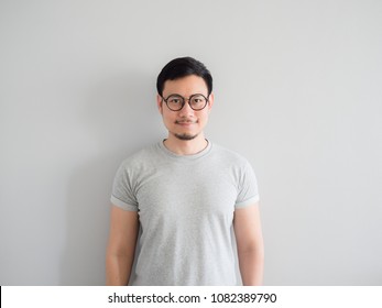 Normal Face Of Ordinary Asian Man With Eyeglasses.