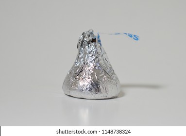 Norman, OK Aug. 8, 2018 A single Hershey's chocolate kiss on a white studio background