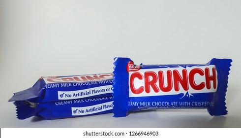 Norman, OK Oct. 31, 2018 Three Mini Crunch Candy Bars On A White Background