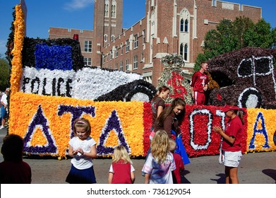 NORMAN, OKLAHOMA - OCTOBER 13 2007: Alpha Phi Omega Float Marches On Street In Homecoming Event