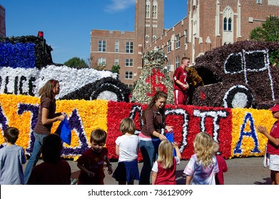 NORMAN, OKLAHOMA - OCTOBER 13 2007: Alpha Phi Omega Float Marches On Street In Homecoming Event