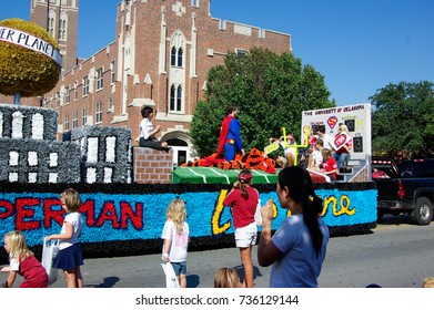 NORMAN, OKLAHOMA - OCTOBER 13 2007: Superman Float Marches On Street In Homecoming Event