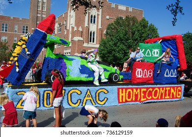 NORMAN, OKLAHOMA - OCTOBER 13 2007: A Colorful Float Marches On Street In Homecoming Event