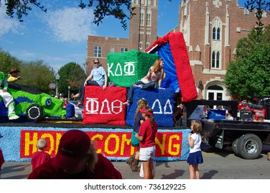 NORMAN, OKLAHOMA - OCTOBER 13 2007: A Colorful Float Marches On Street In Homecoming Event