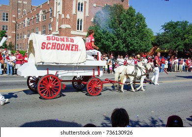 NORMAN, OKLAHOMA - OCTOBER 13 2007: Sooner Schooner Wagon Marches On Street In Homecoming Event