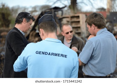 Normandy, France, April 2014.
Arson Attack In A Farm. Farm Building And Farm Equipment Calcined. Rubble. First Observation Of The Police And The Adjuster Investigator With The Farmer