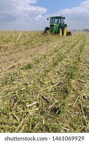 Normandy, France, July 2007.
Crushing Rapeseed Stem After Harvest With A Straw  Chopper