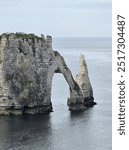 Normandy, France - May 18, 2024: Picturesque panoramic landscape on the cliffs of Etretat. Natural amazing cliffs. Etretat, Normandy, France, La Manche or English Channel. Coast of the Pays de Caux ar